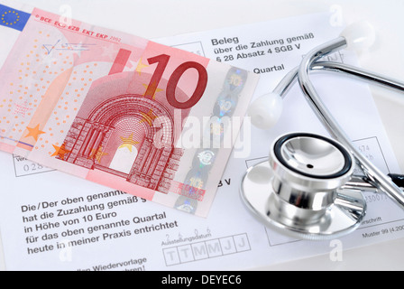 Stéthoscope et de dix dollars, image symbolique pour les frais de pratique Banque D'Images