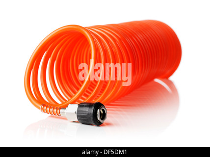 Spirale rouge fine orange flexible d'air utilisé pour outils pneumatiques. Banque D'Images