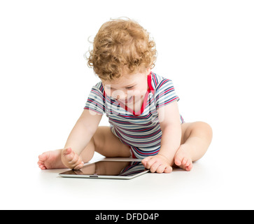 Baby boy playing with digital tablet isolated on white Banque D'Images