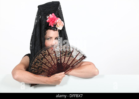 Femme avec mantilla et ventilateur Banque D'Images