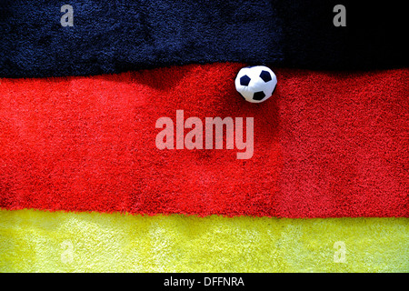 Le football drapeau allemand qui est faite de trois tapis Banque D'Images