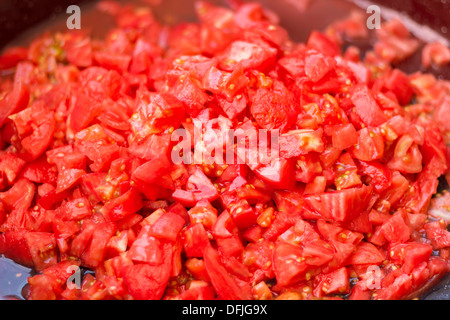 Dés de tomates biologiques sains Banque D'Images