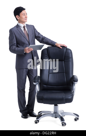 Mature businessman with digital tablet Banque D'Images