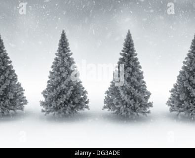 Rangée de pins et de chute de neige Banque D'Images