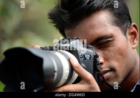 Photographe professionnel, photographe de la faune, d'une caméra et de tir objectif,Jeune Adulte,Inde,étudiant Banque D'Images