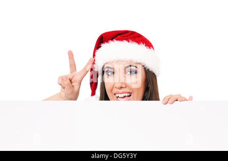 Girl in Santa hat Banque D'Images