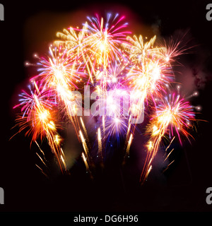 Or rose et coloré d'artifice pour les fêtes. Banque D'Images