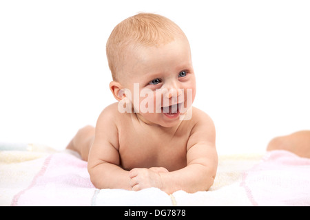 Cute baby boy smiling over white Banque D'Images