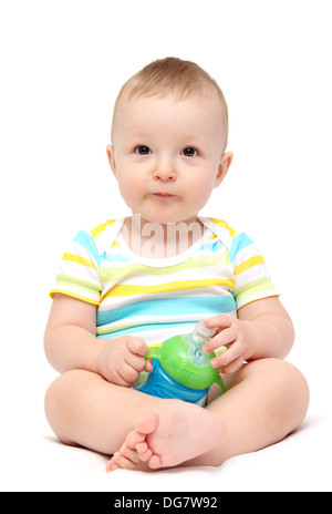 Happy Baby Boy holding bouteille de lait Banque D'Images