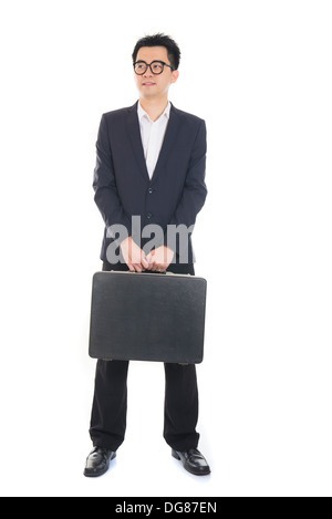 Asian young business man with suitcase isolé sur fond blanc Banque D'Images