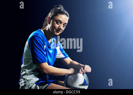 Studio shot of female soccer player Banque D'Images