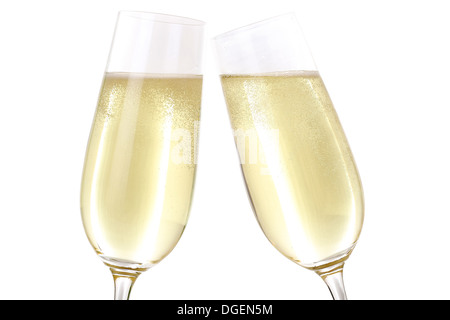 Faire un toast avec deux verres remplis de Champagne Banque D'Images