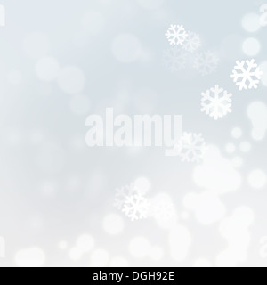 Fête Noël arrière-plan flou avec flocons de neige Banque D'Images