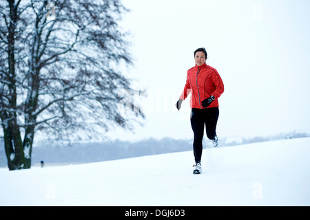 Neige femme tournant Banque D'Images