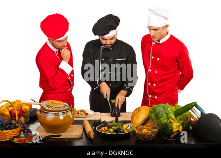 Avec les élèves de l'enseignant chef de cuisine dans l'enseignement Banque D'Images