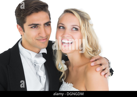 Smiling handsome époux posant avec son épouse Banque D'Images