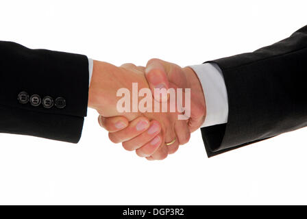 Deux hommes se serrant la main, image symbolique pour sceller une transaction d'affaires Banque D'Images