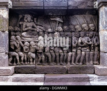 Wall relief du complexe des temples de Borobudur, site inscrit au Patrimoine Mondial de l'UNESCO, Borobudur, Yogyakarta, Java, Indonésie Banque D'Images