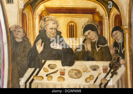 Le christianisme catholique, saint Benoît de Nursie et sainte Scholastique, avec des aliments et des boissons sur la table, de l'école ombrienne, fresque, Banque D'Images