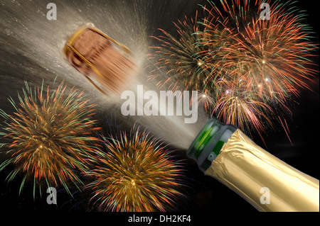 Bouteille de champagne popping avec firework Banque D'Images
