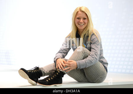 Eching, Allemagne. 30Th Oct, 2013. Le biathlète Miriam Goessner est photographié après une conférence de presse de l'Association allemande de ski (DSV) dans Eching, Allemagne, 30 octobre 2013. Photo : Andreas Gebert/dpa/Alamy Live News Banque D'Images