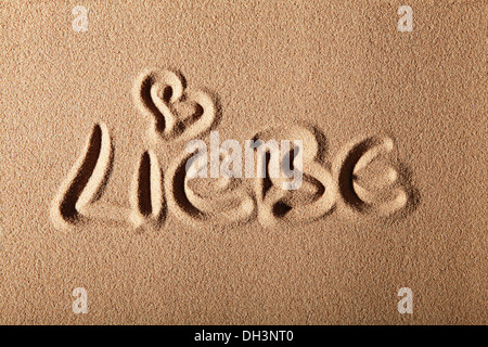 L'écriture dans le sable 'LIEBE' ou 'Love' Banque D'Images