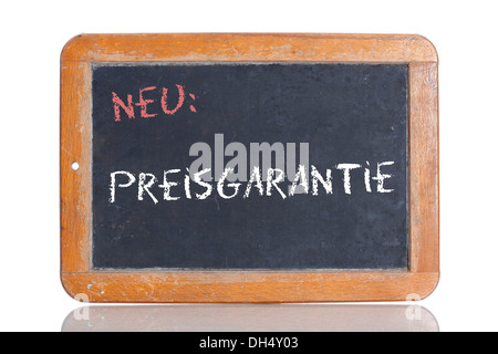 Ancienne école tableau avec les mots NEU : PREISGARANTIE, Allemand pour les nouveaux : prix garanti Banque D'Images