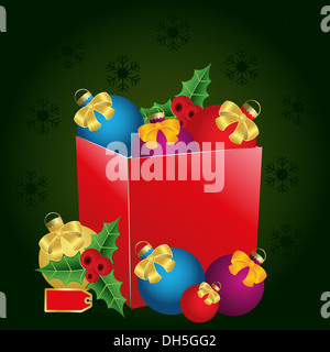 Boîte cadeau de Noël avec l'étiquette de prix, des arcs et des balles Banque D'Images