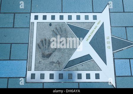 Tony Leung Chiu Wai's étoile sur l'Avenue of Stars à Kowloon, Hong Kong. Banque D'Images