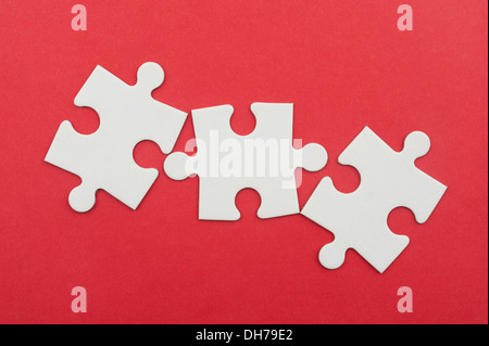 Group de papier blanc Jigsaw puzzles Banque D'Images