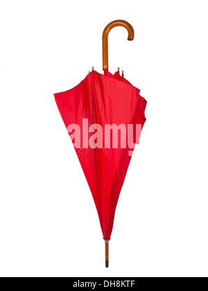 Fermé parapluie rouge isolé sur fond blanc Banque D'Images