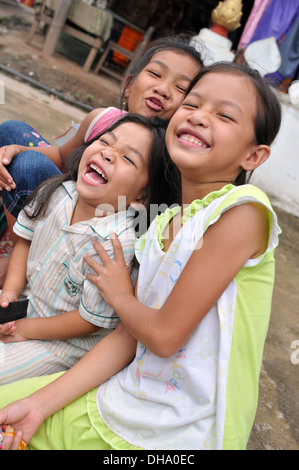 Enfants Lao rire de Luang Prabang, Laos. Banque D'Images