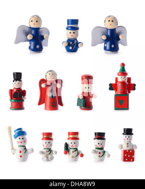 Décorations de Noël : groupe de petites figurines de style rétro, de décorations de Noël, isolé sur fond blanc Banque D'Images