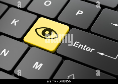 Concept de sécurité : Eye on computer keyboard background Banque D'Images