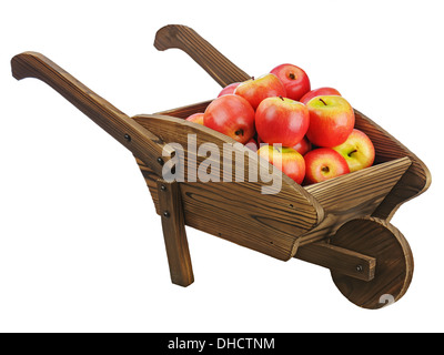 Pommes rouges sur pushcart en bois isolé sur fond blanc. Libre. Banque D'Images