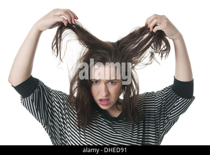 Femme avec les cheveux en bataille Banque D'Images