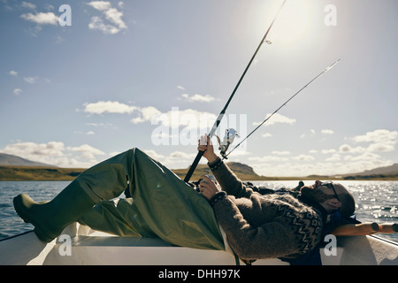 Les hommes sur voyage de pêche Banque D'Images