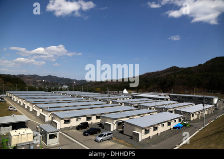 La maison pour tous- Kamaishi, Kamaishi, au Japon. Architecte : Riken Yamamoto, 2013. Vue d'ensemble montrant un logement temporaire. Banque D'Images