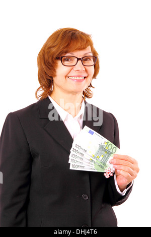 Redhead business woman holding de l'argent avec flocon de Noël, isolé Banque D'Images