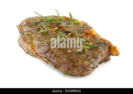 Cou de porc grillé Steak mariné aux fines herbes, isolé Banque D'Images
