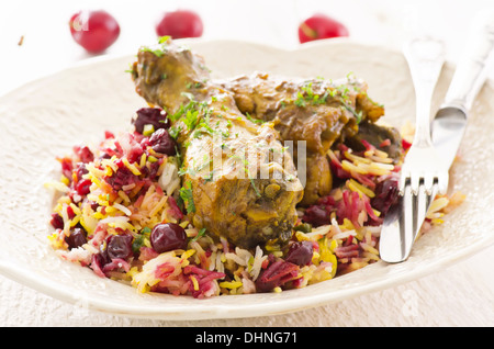 Poulet avec riz safrané et griottes Banque D'Images