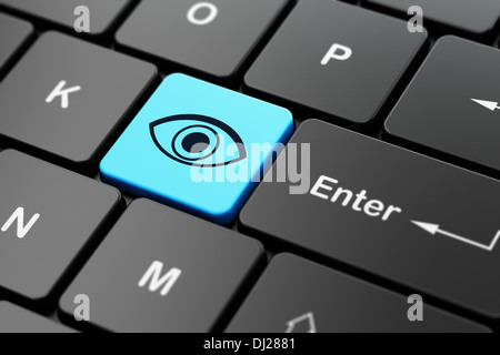 Concept de la vie privée : Eye on computer keyboard background Banque D'Images