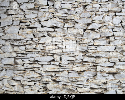 Mur de pierres peintes en blanc Banque D'Images