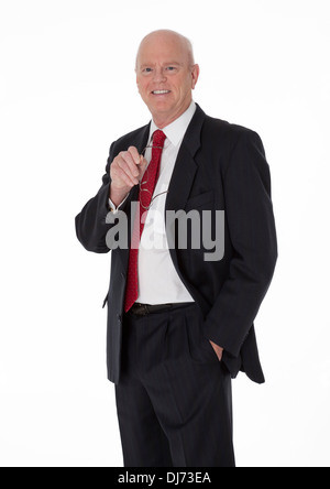 Balding cheerful mature businessman habillés en costume noir sur fond blanc Banque D'Images