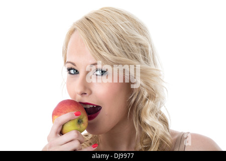 Parution du modèle. attractive young woman eating a red apple Banque D'Images