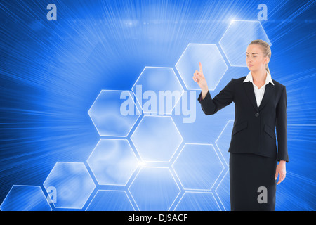 Image composite de jeune blonde business woman pointing Banque D'Images