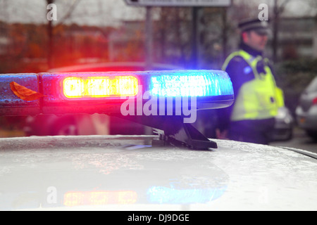 Voiture de police à un incident Banque D'Images