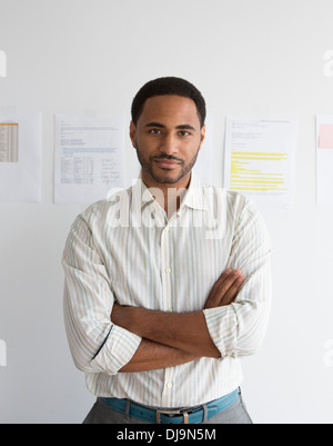 Black businessman standing in office