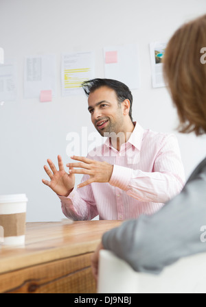 Businessman talking in meeting Banque D'Images