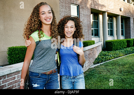 Mixed Race girls smiling Banque D'Images